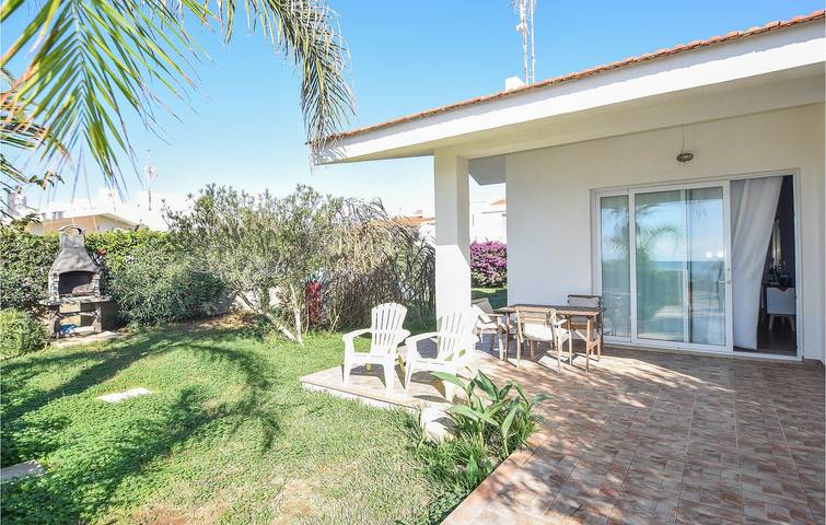 Casa vacanza per 5 persone, con Terrazza e Giardino a Punta Braccetto