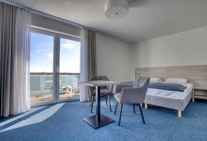 Apartament wakacyjny dla 2 osób, z balkon w Ryn
