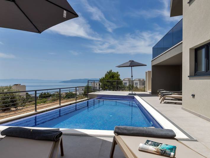Ferienhaus für 8 Personen, mit Balkon und Terrasse sowie Garten