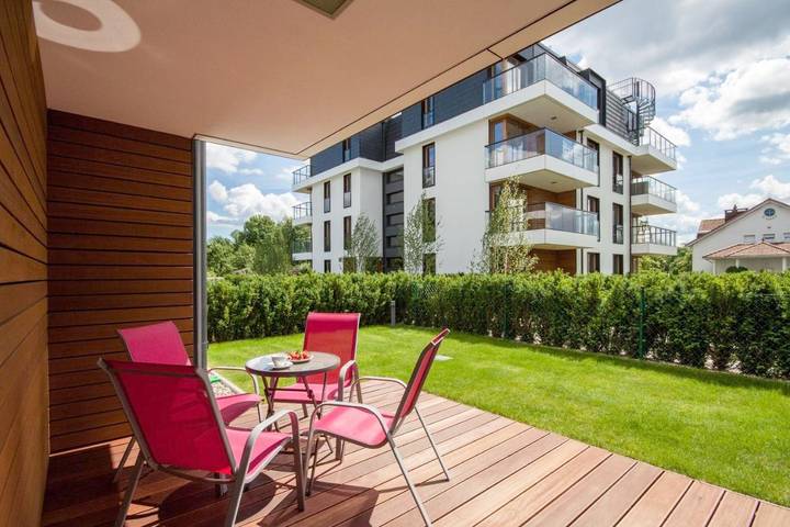 Apartament wakacyjny dla 4 osób, z Taras i Ogród oraz Widok w Jelitkowo