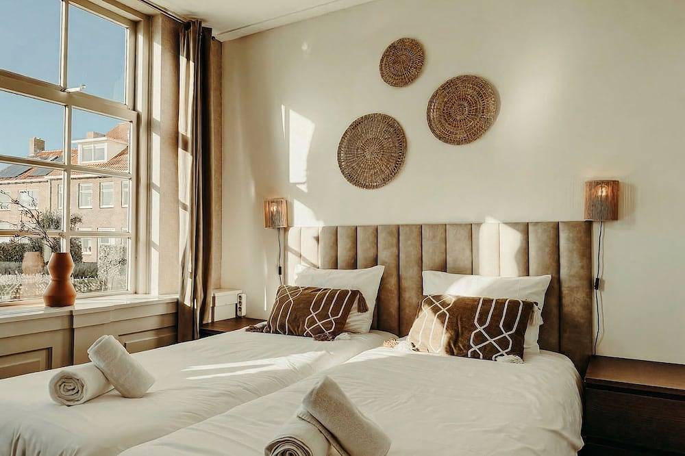 Geräumige Suite im Erdgeschoss in Zoutelande, ideal für Paare oder kleine Familien. Klimatisiert, eigenes Bad, babyfreundliche Annehmlichkeiten und in der Nähe von Strandterrassen und der Küste. in Zoutelande, Walcheren