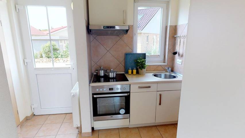 Helles Ferienhaus für 4 Personen mit Hund, Kamin, Strandkorb und Sauna in Strandnähe in Südstrand Pelzerhaken, Ostholstein