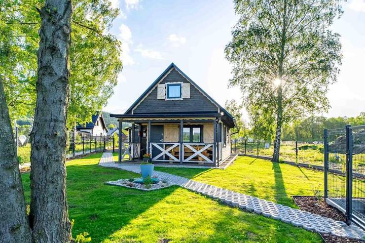 Dom dla 6 osób, z Jacuzzi i Taras oraz Ogród i Sauna w Miłków
