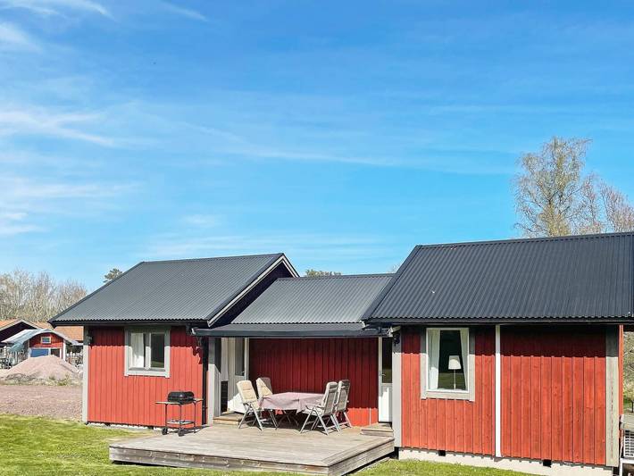 Ferienhaus für 4 Personen, mit Balkon und Terrasse sowie Garten und Seeblick