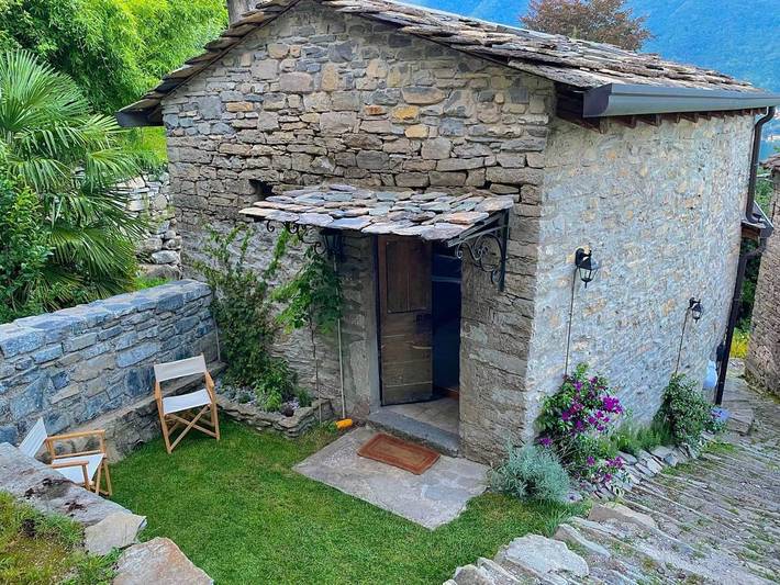 Ferienhaus für 4 Personen, mit Terrasse und Garten sowie Seeblick und Ausblick