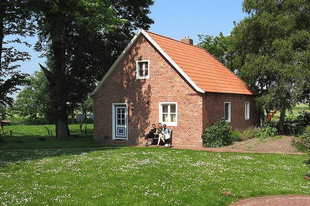 Ferienhaus Historisches Backhaus - Ferienhof Historisches Altwerdumer Grashaus in Werdum, Landkreis Wittmund