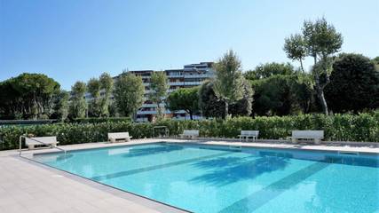 Ferienwohnung für 4 Personen, mit Pool und Garten in Porto Santa Margherita