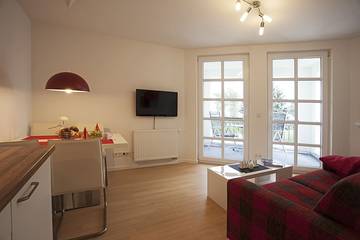 Ferienwohnung für 3 Personen, mit Balkon und Sauna sowie Seeblick am Balmer See