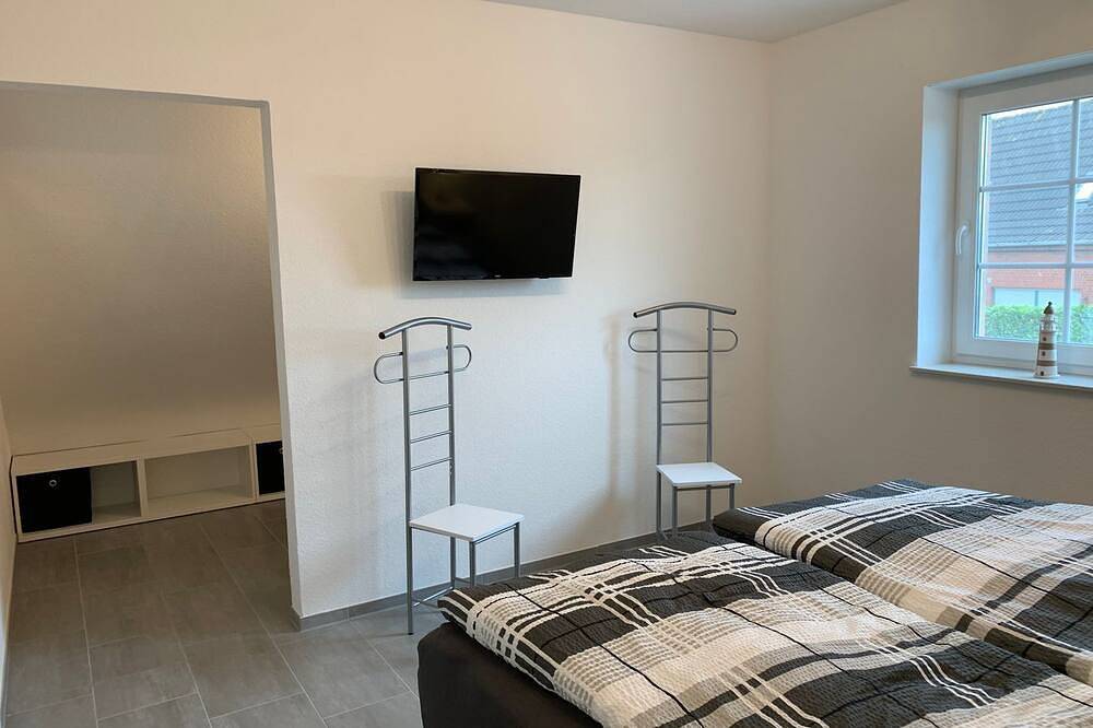 Loppi Hus - Hochwertiges Ferienhaus in direkter Kanallage in Loppersum (Hinte), Hinte