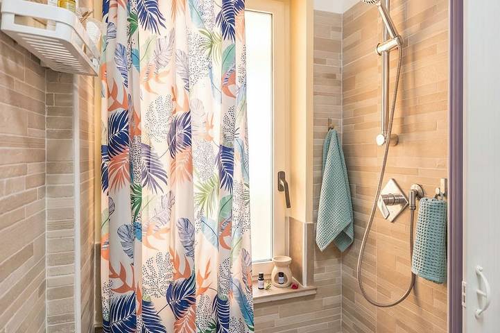 Entire apartment, Cozy Apartment with a Terrace, 2 Minutes from the Beach (Miranaxos) in Giardini-Naxos, Messina Province