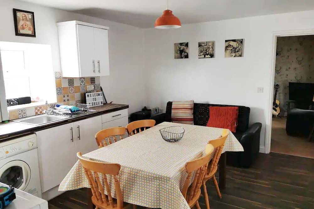 Teach Condy's Cottage nestled at the bottom of Sliabh Liag Cliffs, Co. Donegal in Donegal, County Donegal