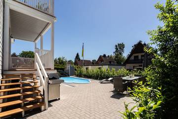 Ferienwohnung für 8 Personen, mit Terrasse und Pool, mit Haustier in Ratekau