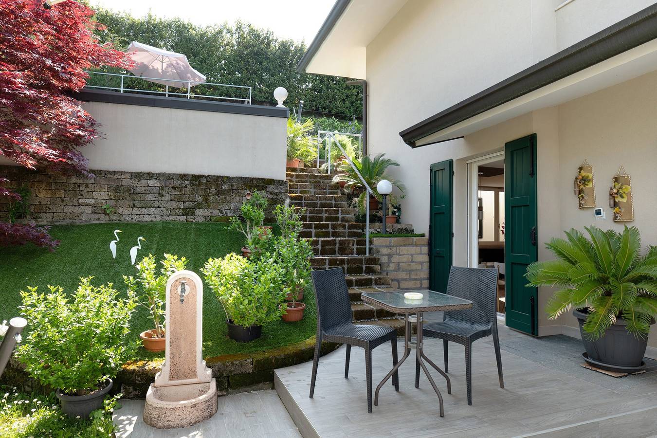 Appartement 'Villa Benaco' met gedeeld zwembad, terras en tuin, foto 6