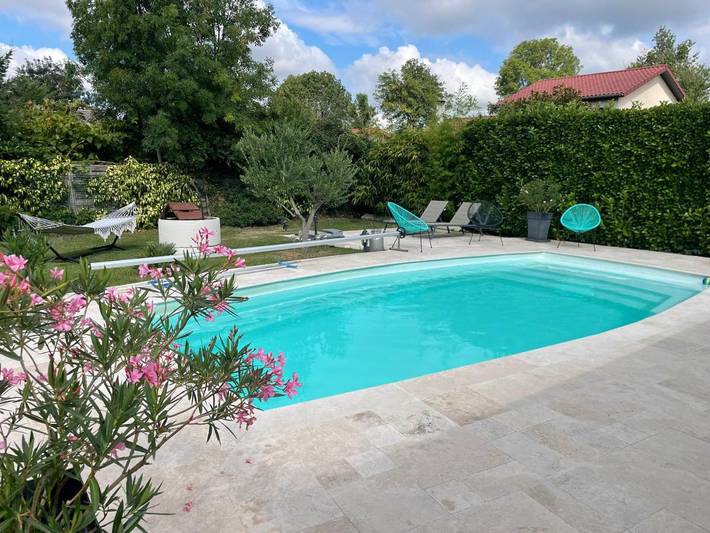 Appartement de vacances pour 4 personnes, avec jardin ainsi que terrasse et piscine