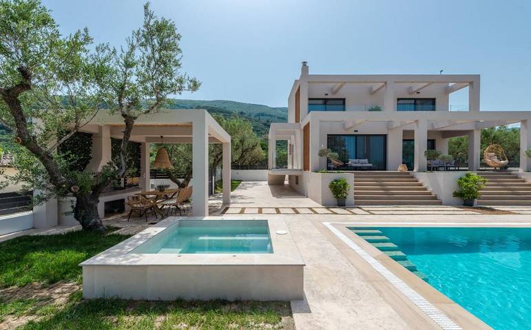 Διαμερίσματα διακοπών για 10 άτομα, με Μπαλκόνι και Μπανιέρα υδρομασάζ καθώς και Ταράτσα και Κήπο στον Παντοκράτορα