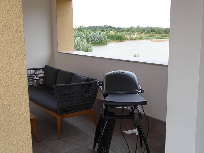 Ferienwohnung für 3 Personen, mit Terrasse und Sauna sowie Ausblick und Seeblick am Störmthaler See