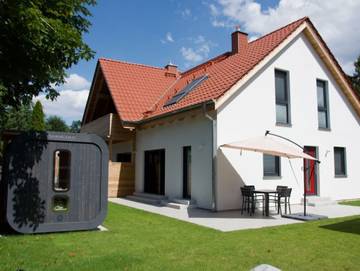 Ferienwohnung für 4 Personen, mit Whirlpool und Garten sowie Sauna und Terrasse in Göhren-Lebbin