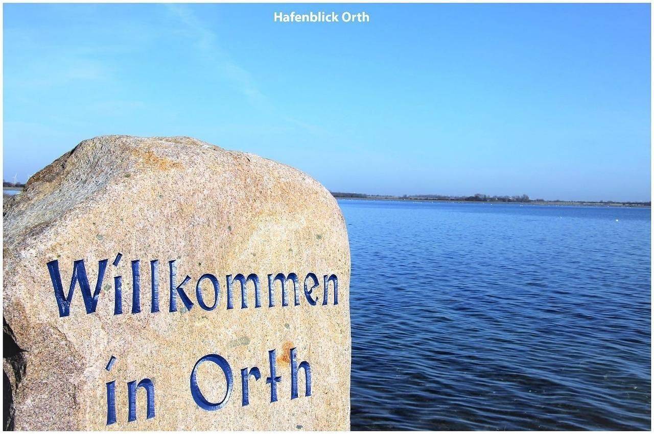 Ganze Wohnung, Hafenblick Orth: Modernes Apartment mit gutem Meerblick, Balkon und Fitnessraum in Westfehmarn, Fehmarn