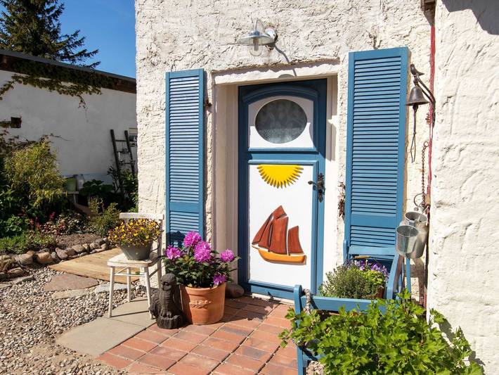 Ferienwohnung für 2 Personen, mit Terrasse und Garten, kinderfreundlich in Kröslin