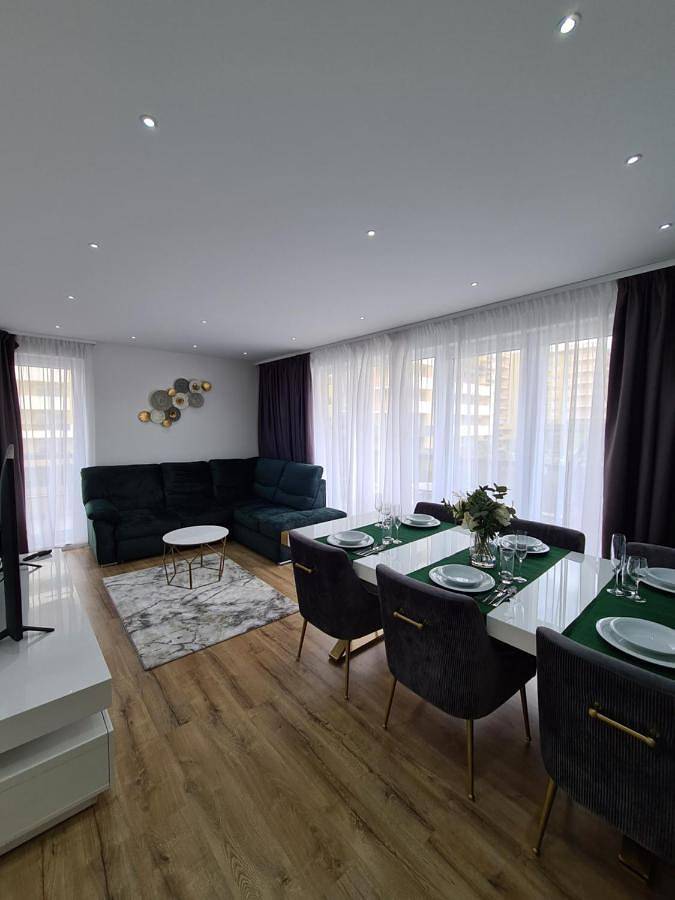 Appartement de vacances pour 6 personnes, avec Balcon et Terrasse ainsi que Jardin et Vue sur le lac
