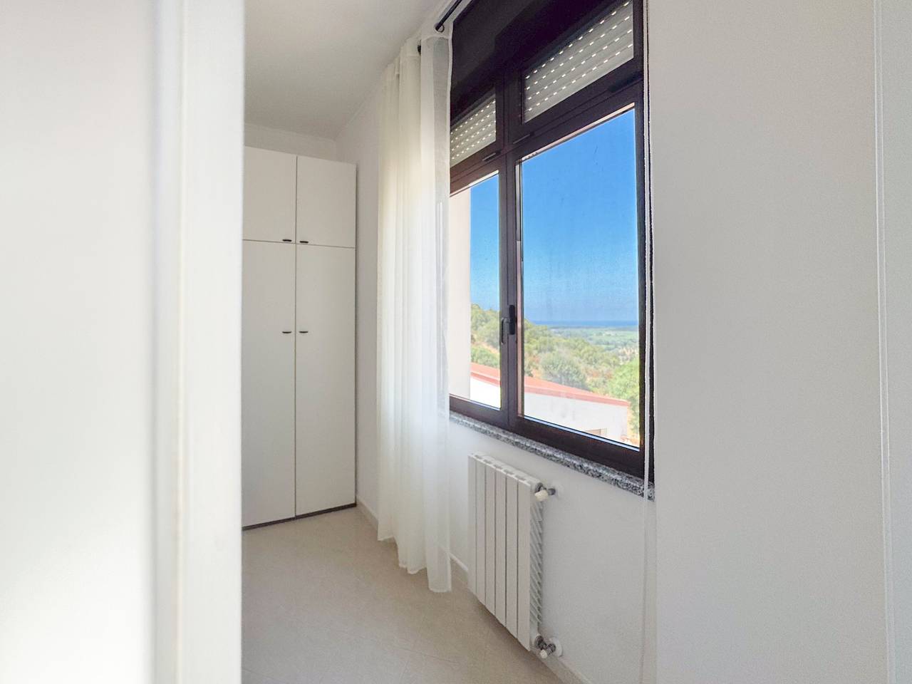 Camera familiare con bagno privato e vista mare in Gonnesa, Iglesiente