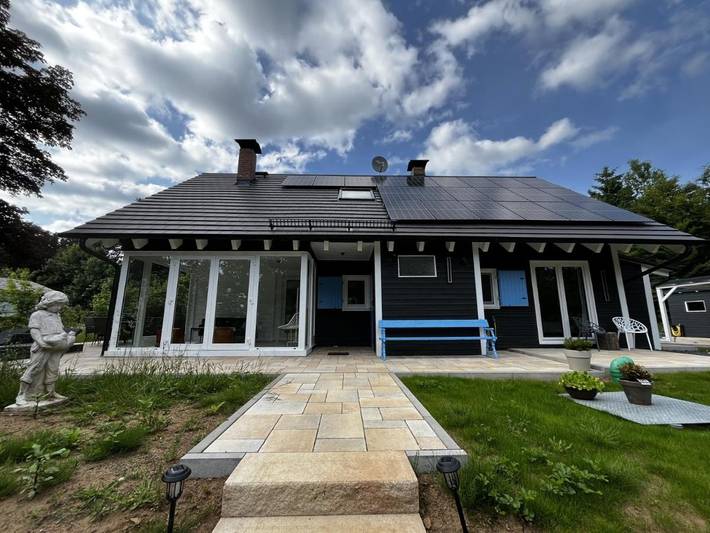 Ferienhaus für 9 Personen, mit Terrasse und Garten sowie Sauna und Ausblick in Schotten