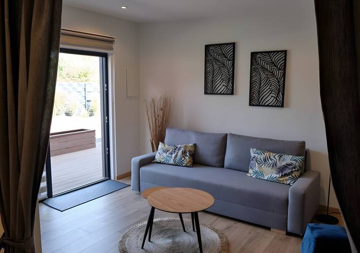 Apartamento entero, Apartamento 'Gîte Au Martin Pêcheur Côté Jardin' con terraza privada, jardín compartido y Wi-Fi in Plobsheim, Región de Estrasburgo