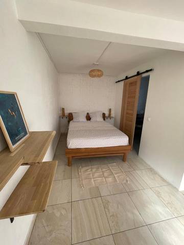 Gîte pour 2 personnes, avec vue ainsi que terrasse et jardin à Vieux-Habitants