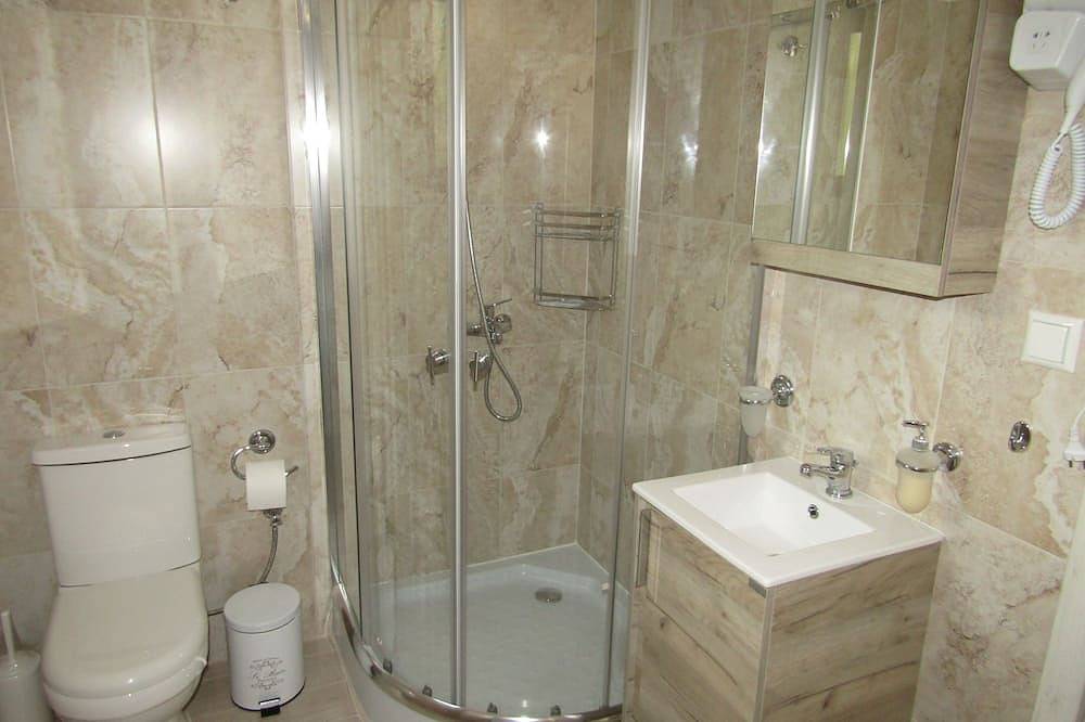 Stone house with pool and view to the sea in Achaia