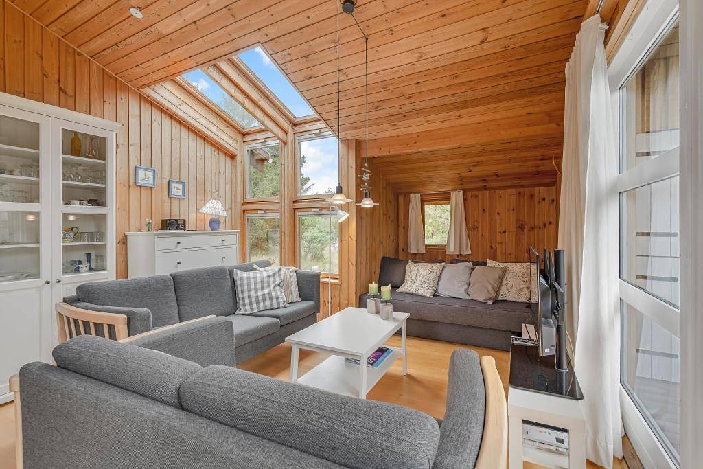 Cosy holiday home nestled in nature with wood-burning stove in Plage de Vejers, Région de Varde