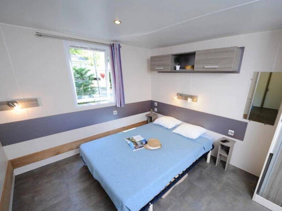 Camping Ushuaïa Villages Rives d'Olt et Aubrac - Mobilhome 4 personnes - Mh Classique 2 chambres 4 personnes Pmr in Saint-Geniez-d'Olt-et-d'Aubrac, Massif central