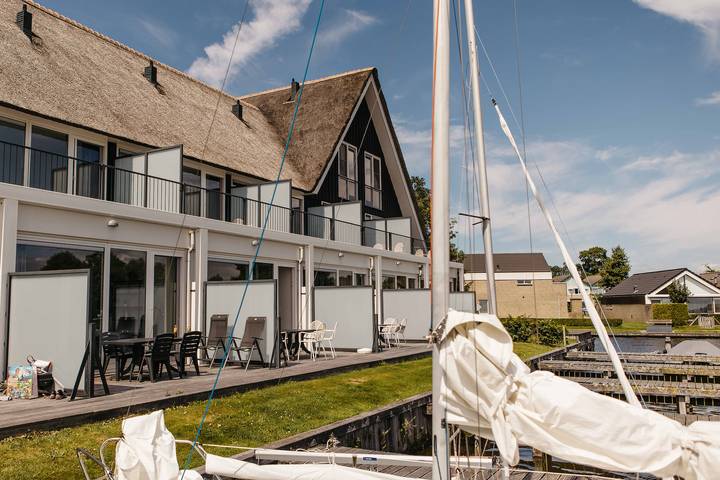Ferienhaus für 6 Personen, mit Balkon und Balkon/Terrasse sowie Terrasse und Garten