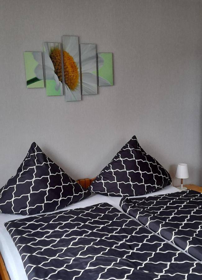 Ferienwohnung für 4 Personen, mit Balkon und Terrasse sowie Garten und Ausblick