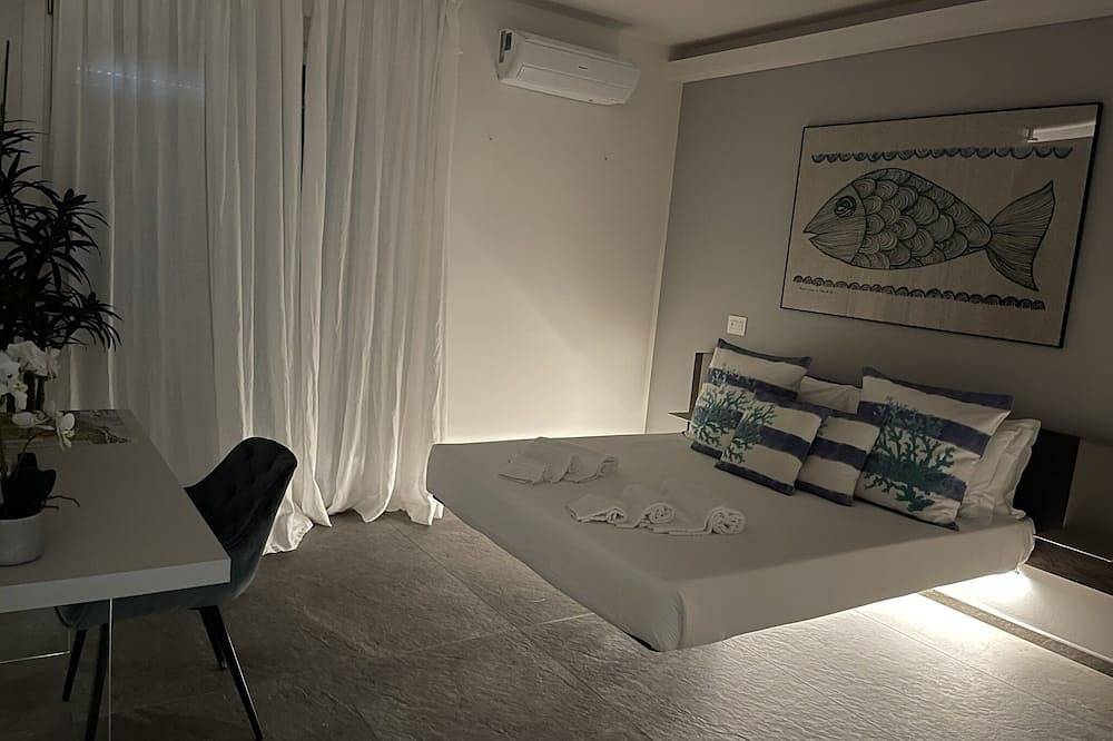 Appartement entier, Appartement au sol - Villa Elvira in Gardone Riviera, Montagnes autour du lac de Garde