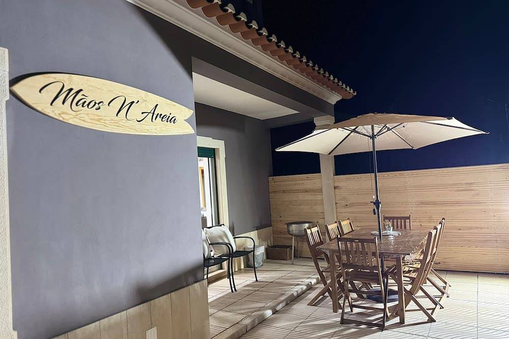 Hands in the sand in Baleal, Leiria District