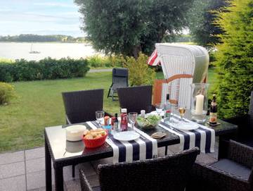 Ferienhaus für 4 Personen, mit Terrasse und Seeblick sowie Ausblick und Garten, kinderfreundlich in Sellin