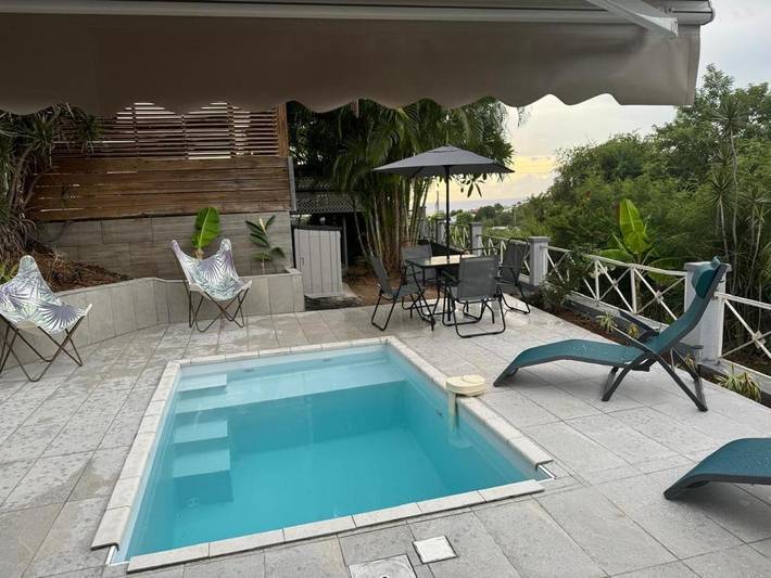 Location de vacances pour 6 personnes, avec piscine ainsi que vue et jardin à Vieux-Habitants - 2