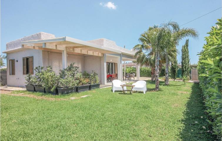 Casa vacanza per 5 persone, con Terrazza e Giardino a Porto Palo