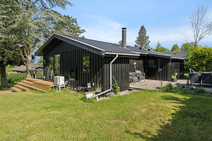 Filter.beach_travel.vacation_home für 4 Personen, mit Terrasse und Garten sowie Seeblick in Vellerup