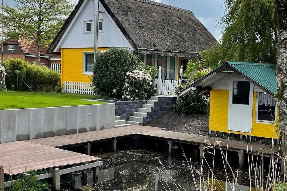 Bezauberndes Ferienhaus am Großen Meer - Romantisches schwedisches Holzhaus mit Reetdach