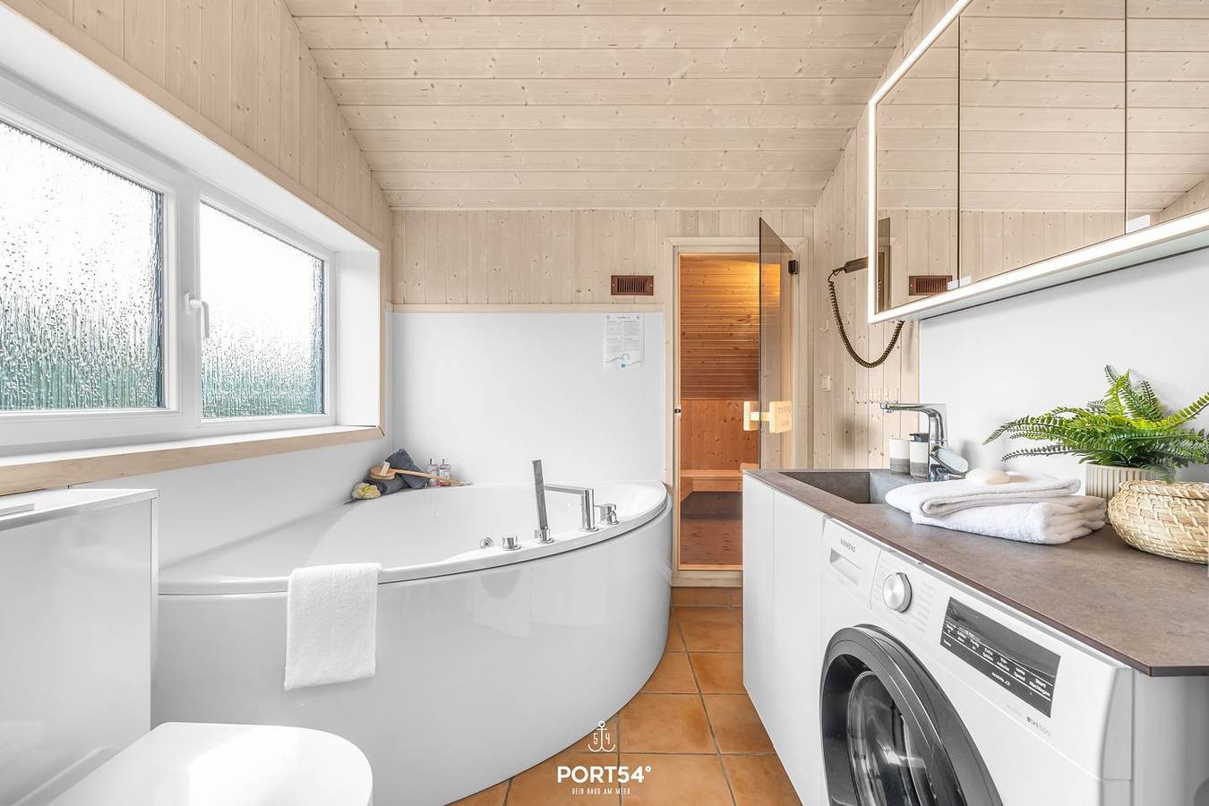 Skandinavisches Ferienhaus Möwenstübchen mit Sauna, Whirlpool und Klimaanlage in Lensterstrand, Grömitz