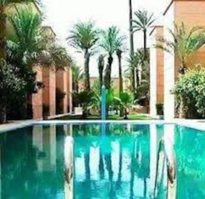 Appartement de vacances pour 6 personnes, avec jardin ainsi que vue et piscine à Marrakech
