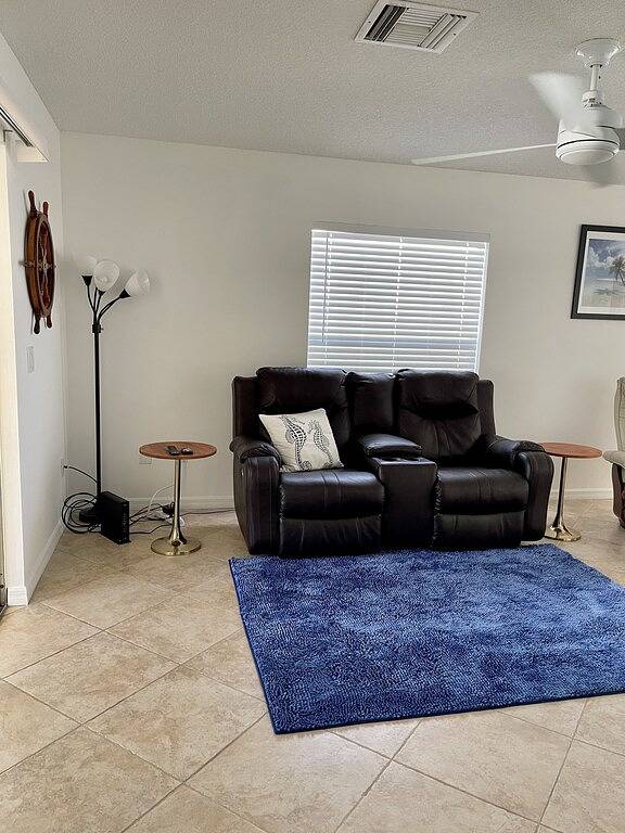 Courtyard Villa with gas golf cart located between two Town Squares! in The Villages, Sumter County