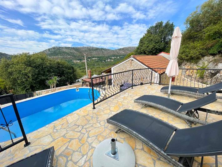 Ferienhaus für 6 Personen, mit Balkon und Garten