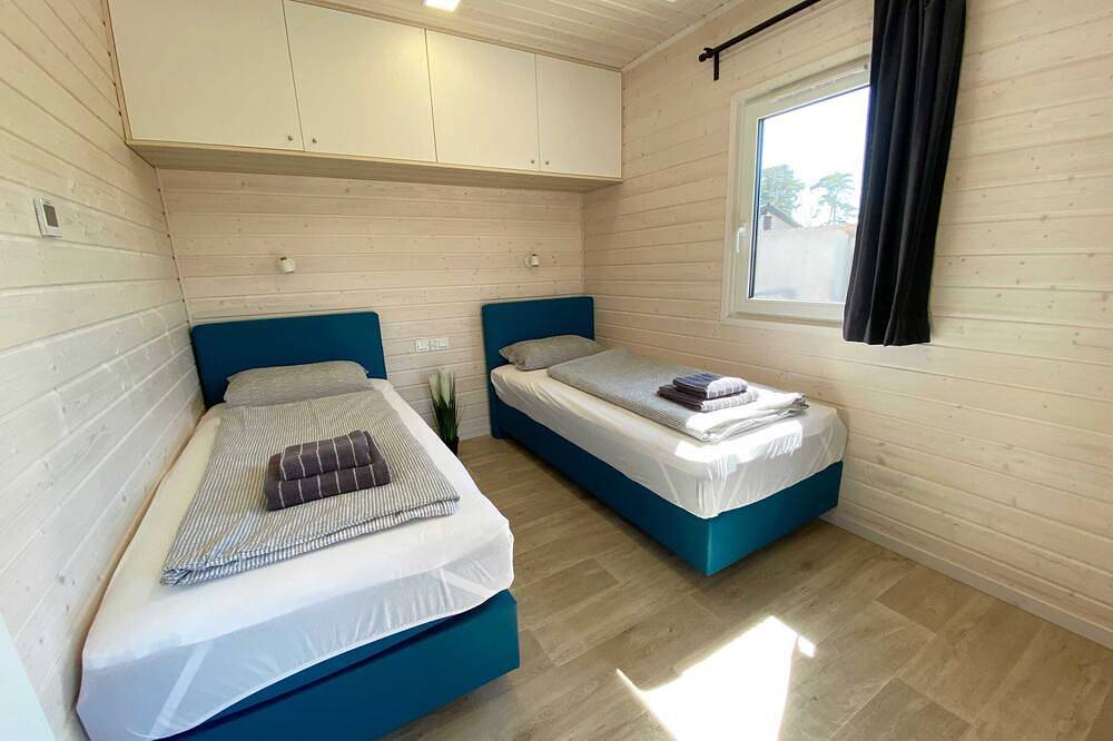 Ferienhaus Wassermann mit Boxspringbetten und großer Terrasse in Wunstorf, Steinhuder Meer