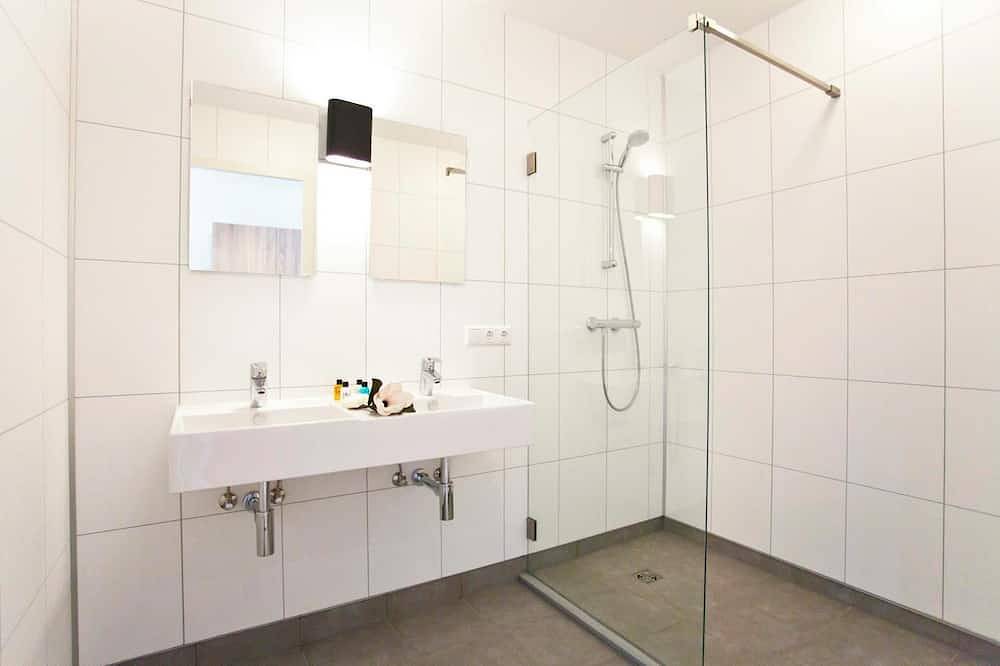 Studio met woon-slaapkamer en 2 eenpersoonsbedden in Hoge Veluwe