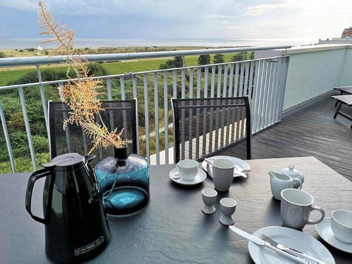 Ferienwohnung mit Meerblick für 2 Personen, mit Terrasse und Seeblick sowie Ausblick in Schillig, Wangerland