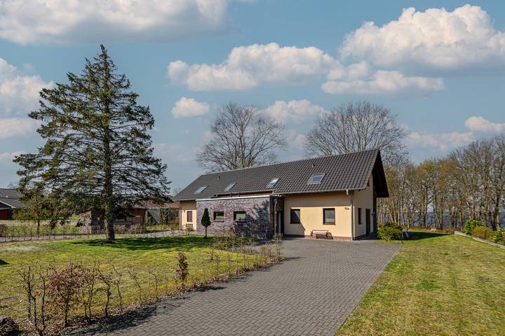 Ferienhaus für 6 Personen, mit Terrasse und Seeblick sowie Garten und Sauna in Lenz