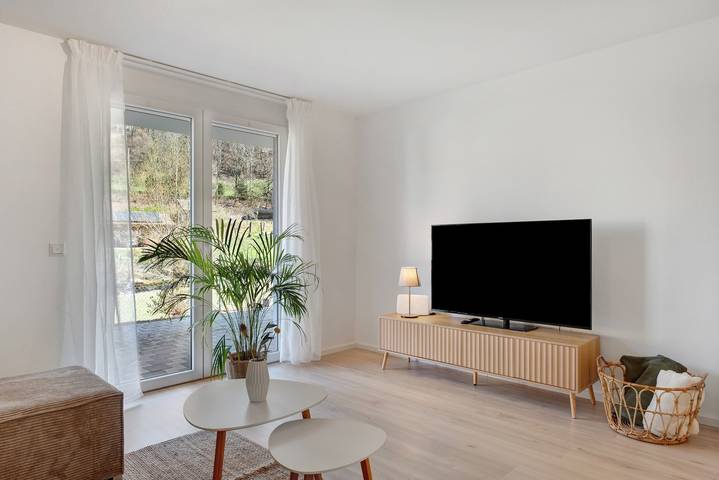 Appartement entier, Appartement "Bachblick" avec vue sur les montagnes, terrasse partagée et Wi-Fi in Falkensteig, Buchenbach