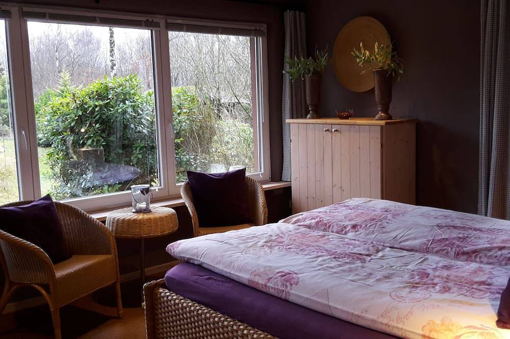 Ferienhausanlage Hilkenberg: Haus 3 mit Kaminofen u. wildromantischem Garten in Bodenfelde, Weserbergland